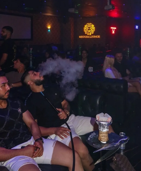 Guests enjoying hookah at Medusa Lounge